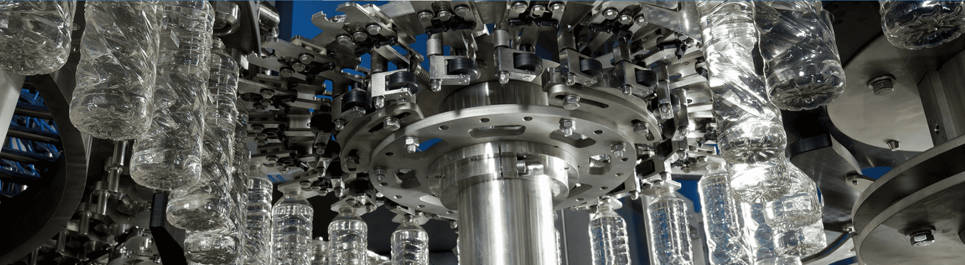 systems integrating the production of preforms with bottling lines